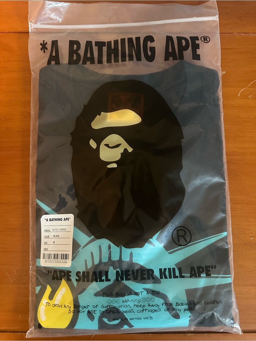 A Bathing Ape Graphic Tee in Black with Teal and Yellow